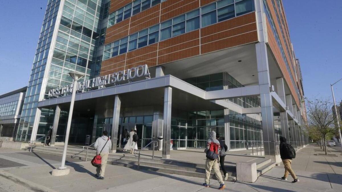 Students enter the Cass Technical High School in Detroit.