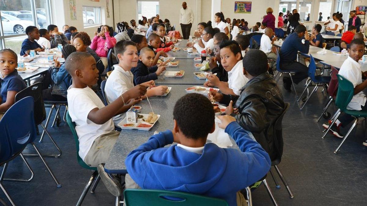 Students eat lunch at Enfield’s Inborden Elementary School, which is part of the Halifax County school system.