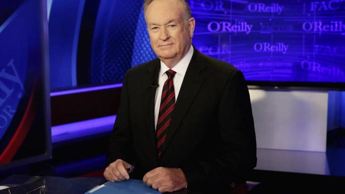 In this Oct. 1, 2015 file photo, host Bill O'Reilly of "The O'Reilly Factor" on the Fox News Channel, poses for photos in the set in New York.