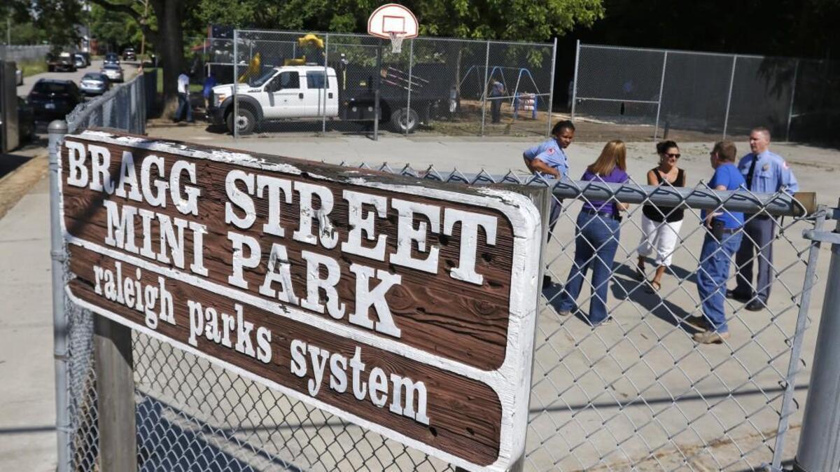 Members of the Raleigh Police, Raleigh Parks, Recreation and Cultural Resources as well as local residents, clergy and businesses met for a work session at the Bragg Street Mini Park at the corner of South Person and Bragg Streets in south Raleigh on June 14, 2016 for a community cleanup of the small city park.