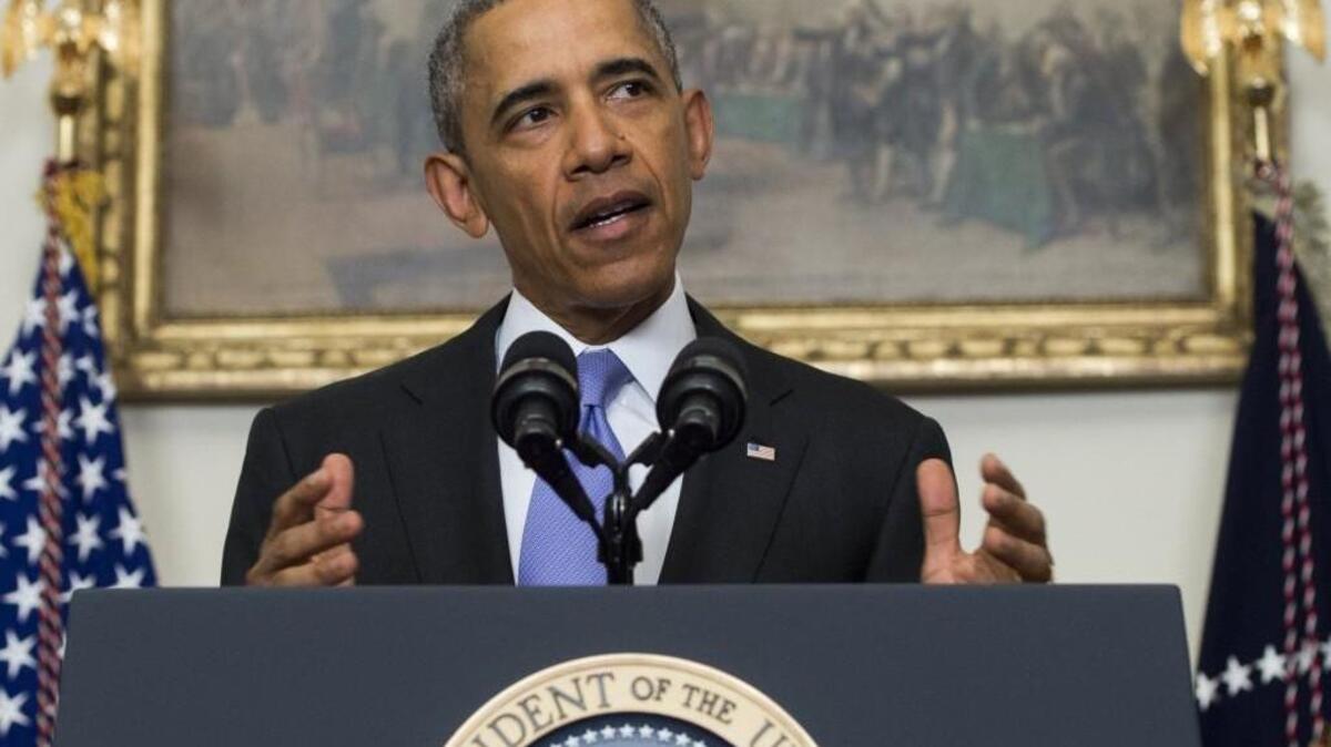 President Barack Obama speaks about US-Iranian relations, including the Iranian-American nationals that were jailed in Iran and were being freed as part of a prisoner swap, in the Cabinet Room of the White House.