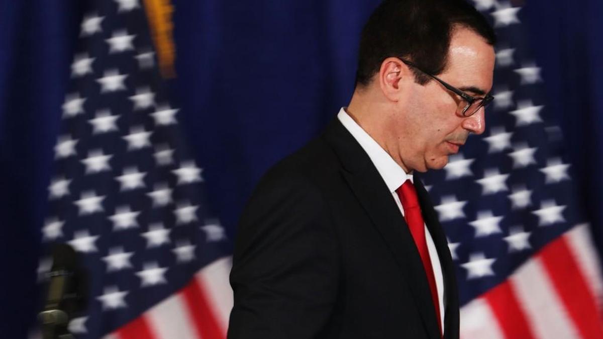 NEW YORK, NY - SEPTEMBER 21: Treasury Secretary Steven Mnuchin walks off the podium following a news conference on September 21, 2017 in New York City. The Treasury Secretary discussed increased sanctions against the regime of North Korea.
