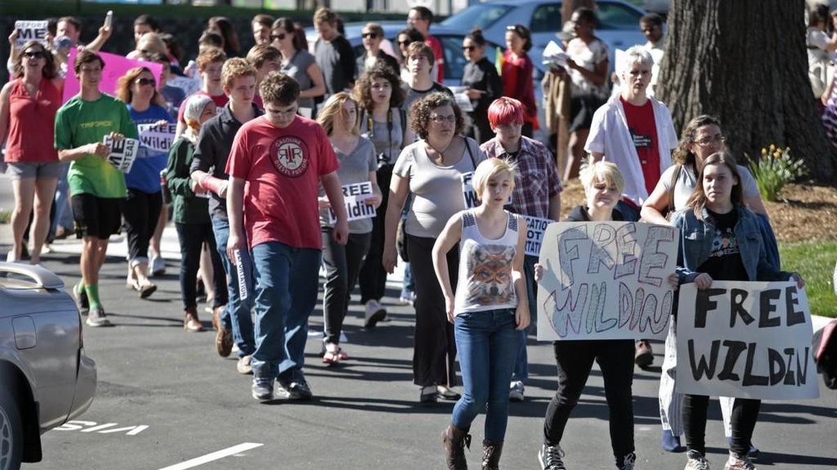 During a vigil for a soon to be deported Durham Riverside High student, Wildin Acosta, about 100 Riverside High School students, faculty, family members and local activists march from the Duke Memorial United Methodist Church to N.C. Rep. G.K. Butterfield’s office in the NC Mutual Building.