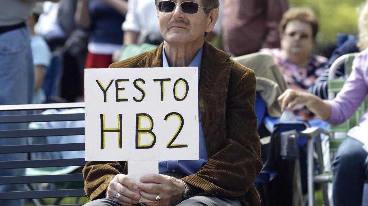 Supporters of House Bill 2 gather at the Capitol in Raleigh