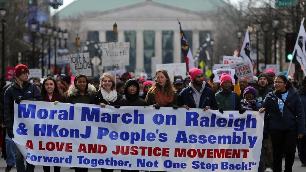Marchers make their way down Fayetteville Street during the Moral March on Raleigh and HKonJ People’s Assembly last year.