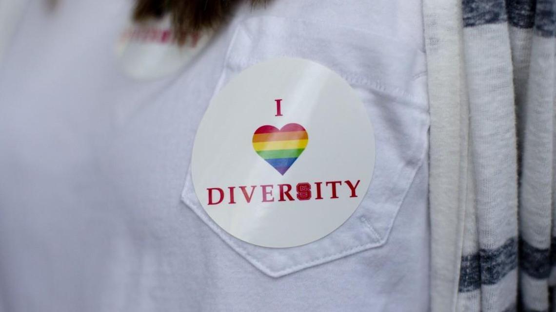 Beth Kunkel wears a sticker on her shirt during a protest against House Bill 2 Thursday, March 24, 2016 outside of the Governors Mansion on North Blount Street in downtown Raleigh