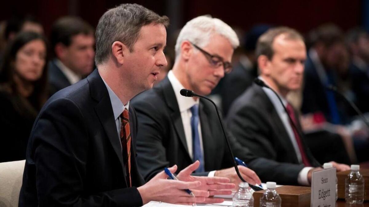 Twitter's Acting General Counsel Sean Edgett, from left, Facebook's General Counsel Colin Stretch and Google's Senior Vice President and General Counsel Kent Walker, testify before a House Intelligence Committee task force hearing on Capitol Hill in Washington, Wednesday, Nov. 1, 2017.
