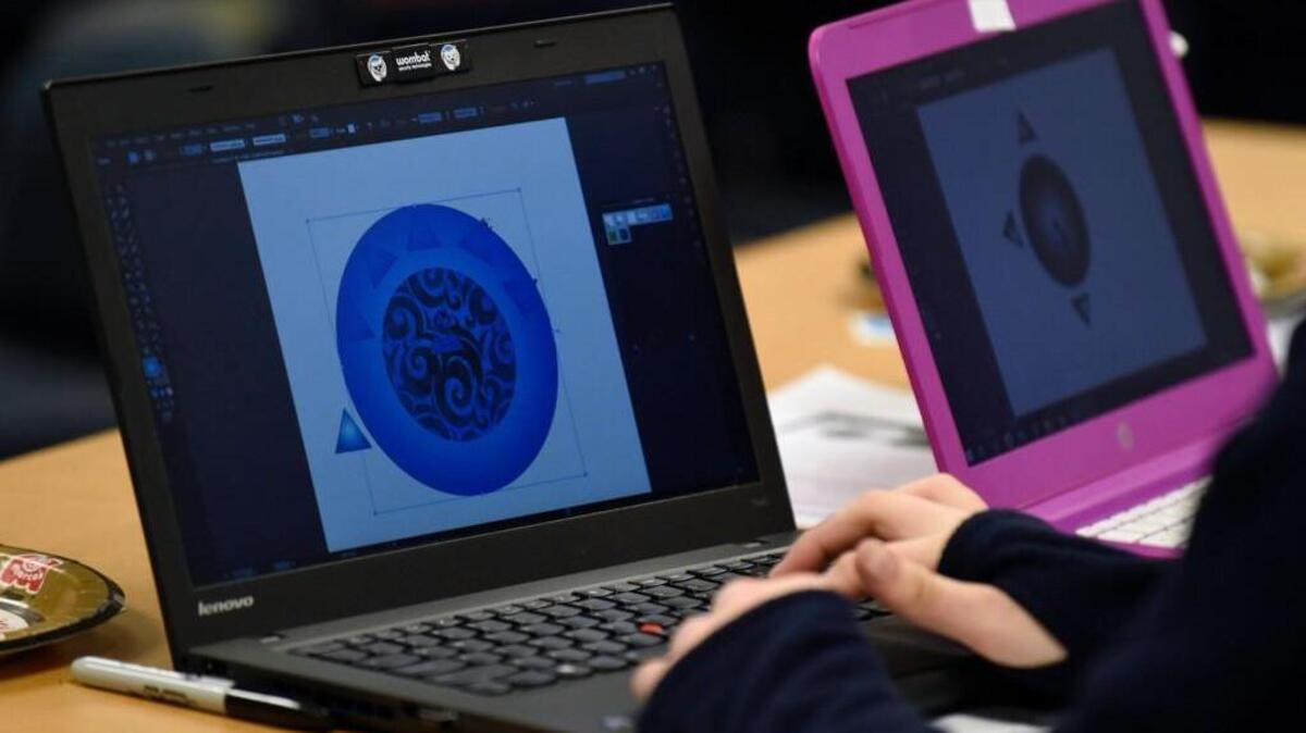 Participants create personal logos using Adobe Illustrator during a graphic design workshop hosted by TechGirlz in Raleigh, N.C. on Thursday, February 4, 2016. TechGirlz holds free workshops for middle school girls on subjects ranging from writing code to designing websites and apps.