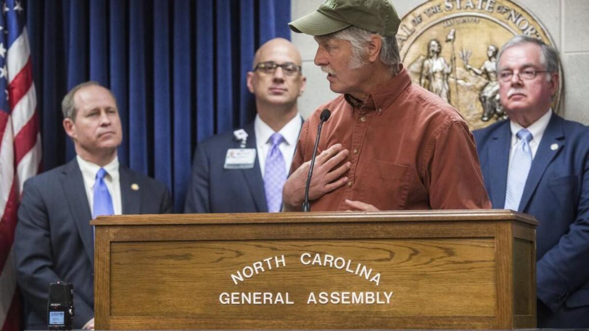 Alex Hitt of Peregrine Farm in Graham praises Republican lawmakers after they introduced the Carolina Cares bill on April 11 at the General Assembly. The proposal would extend government health insurance coverage to individuals who are ineligible for Medicaid due to income levels but are otherwise unable to afford health insurance.