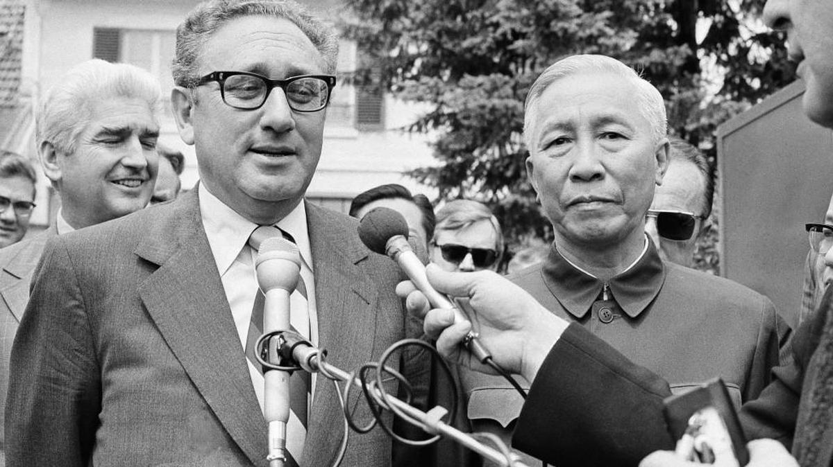 FILE - In this Wednesday June 13, 1973 file photo, President Nixon's National Security Adviser Henry A. Kissinger, left, and Le Duc Tho, member of Hanoi's Politburo, outside a suburban house at Gif Sur Yvette in Paris after a negotiation session. The then-U.S. Secretary of State Kissinger was supposed to share the Nobel Peace Prize with North Vietnamese leader Le Duc Tho for the Paris-brokered cease-fire in the Vietnam war. The Vietnamese leader became the first and only person to refuse the prize. Kissinger didn’t turn up to receive his and continues to be one of the names most closely associated with the Vietnam war, which raged on for another three years.