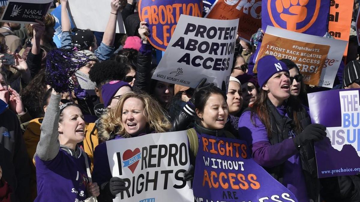 Abortion rights protesters rally outside the Supreme Court in March.