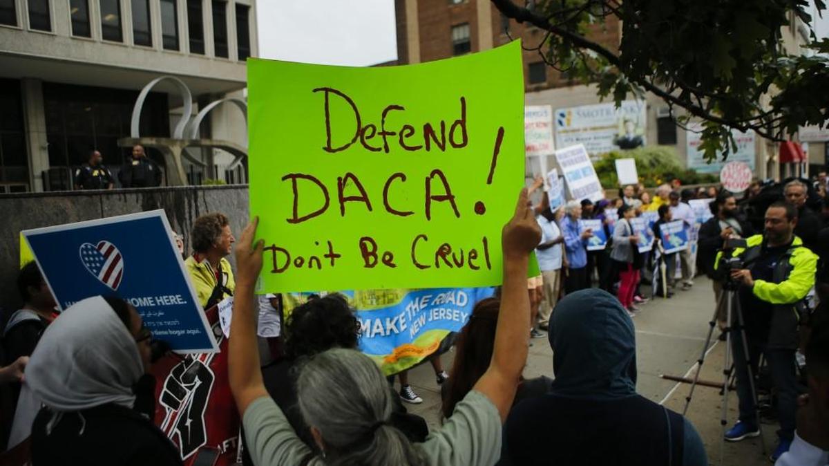 Immigration activists protest the Trump administration's decision to end the Deferred Action for Childhood Arrivals (DACA) program on September 6, 2017 in Newark, New Jersey. The decision represents a blow to young undocumented immigrants, also known as "dreamers," who have been shielded from deportation under DACA.