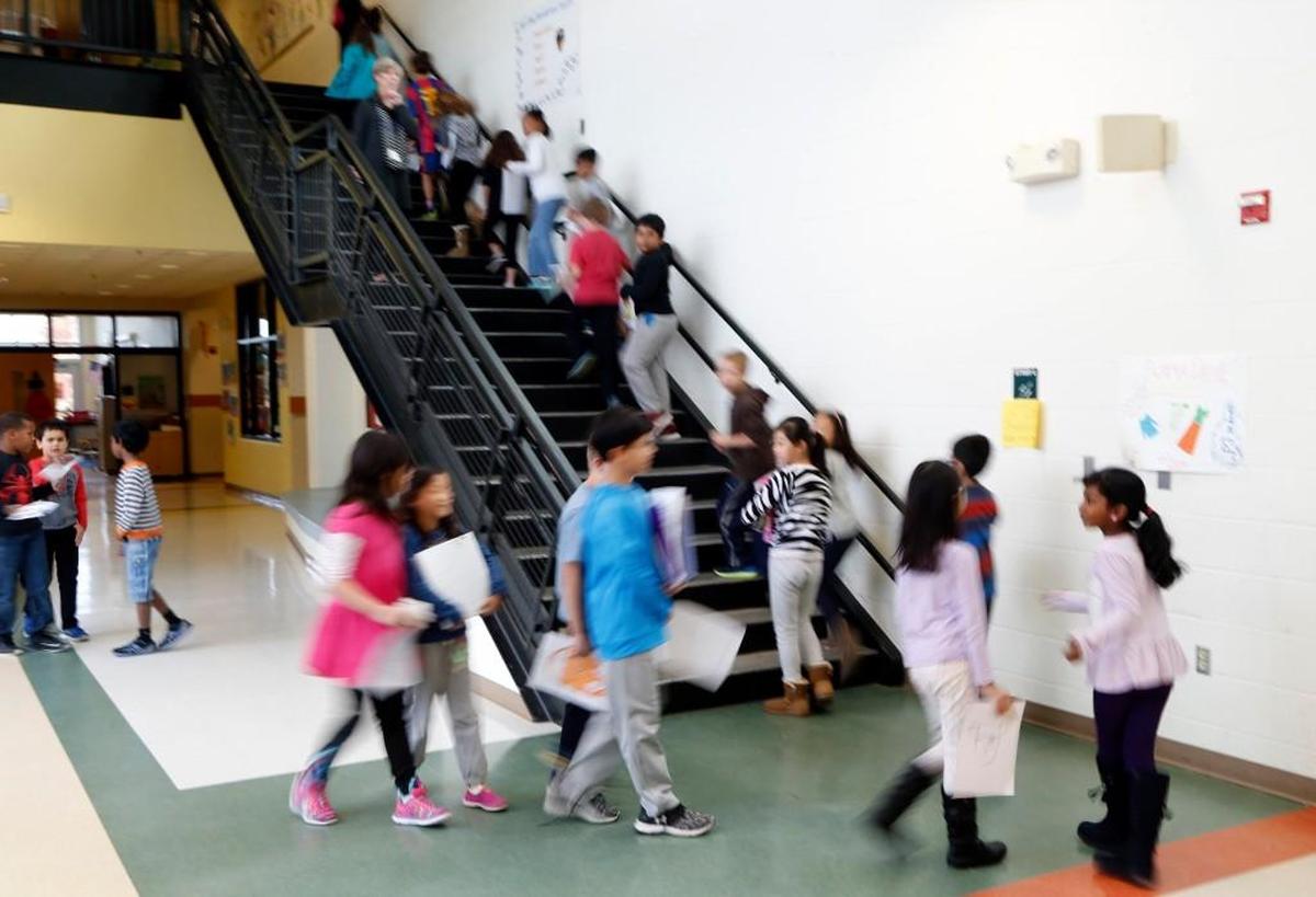 Students move between classes at Mills Park Elementary in Cary, North Carolina.