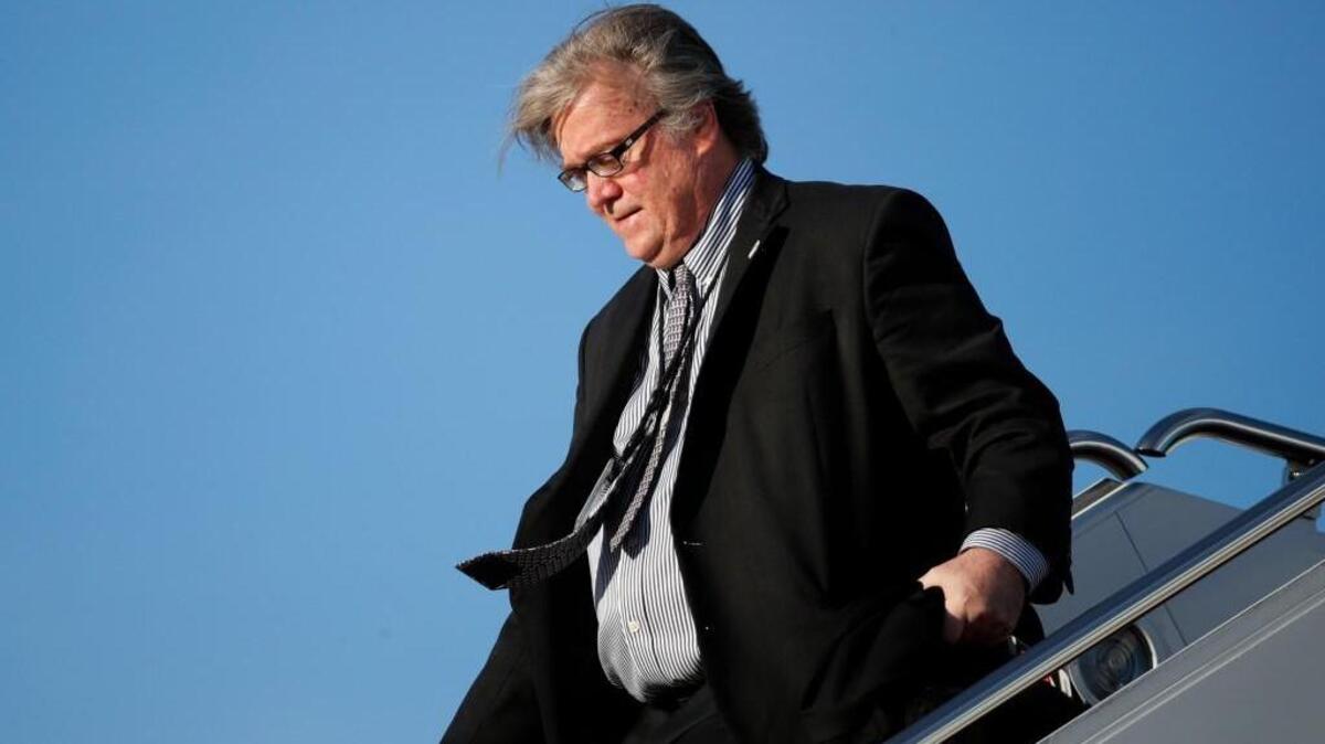 FILE - In this April 9, 2017 file photo, White House chief strategist Steve Bannon steps off Air Force One at Andrews Air Force Base, Md. Bannon, a forceful but divisive presence in President Donald Trump's White House, is leaving, ending a turbulent seven months for his chief strategist, the latest to depart from the president's administration in turmoil.
