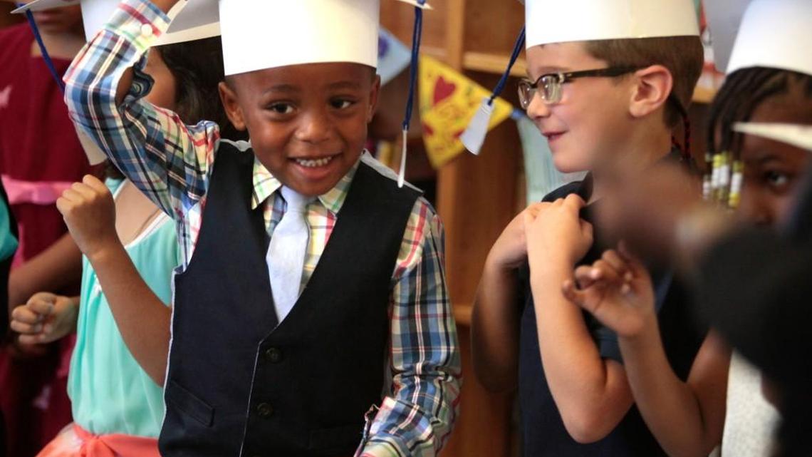 Students participate in a 2016 pre-K graduation at Aversboro Elementary School in Garner. Supporters say President Biden’s Build Back Better Act would provide universal pre-K, raise wages for child care workers, and subsidize the cost of child care for many parents. 