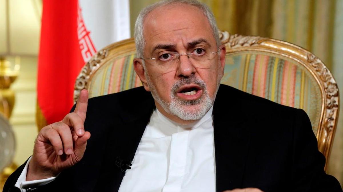 In this April 24, 2018, file photo, Iran's Foreign Minister Mohammad Javad Zarif is interviewed by The Associated Press, in New York. Zarif has taken to YouTube on Thursday, May 3, to criticize President Donald Trump's threat to withdraw from the nuclear deal, saying Iran will not "renegotiate or add onto" the atomic accord.