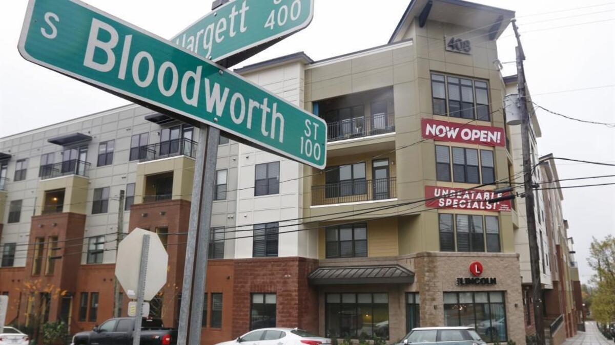 Members of the Concerned Citizens for District C Equity marched around the luxury Lincoln apartments in Raleigh on MLK Day “to send a clear message to City Council that to allow the residential density they allowed that permitted the construction of the Lincoln Apartments without an affordable housing component will not be tolerated going forward.”