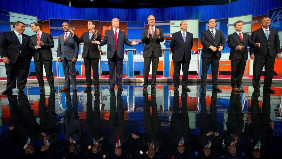 
Republican presidential candidates from left, Chris Christie, Marco Rubio, Ben Carson, Scott Walker, Donald Trump, Jeb Bush, Mike Huckabee, Ted Cruz, Rand Paul and John Kasich take the stage for the first Republican presidential debate at the Quicken Loans Arena.
