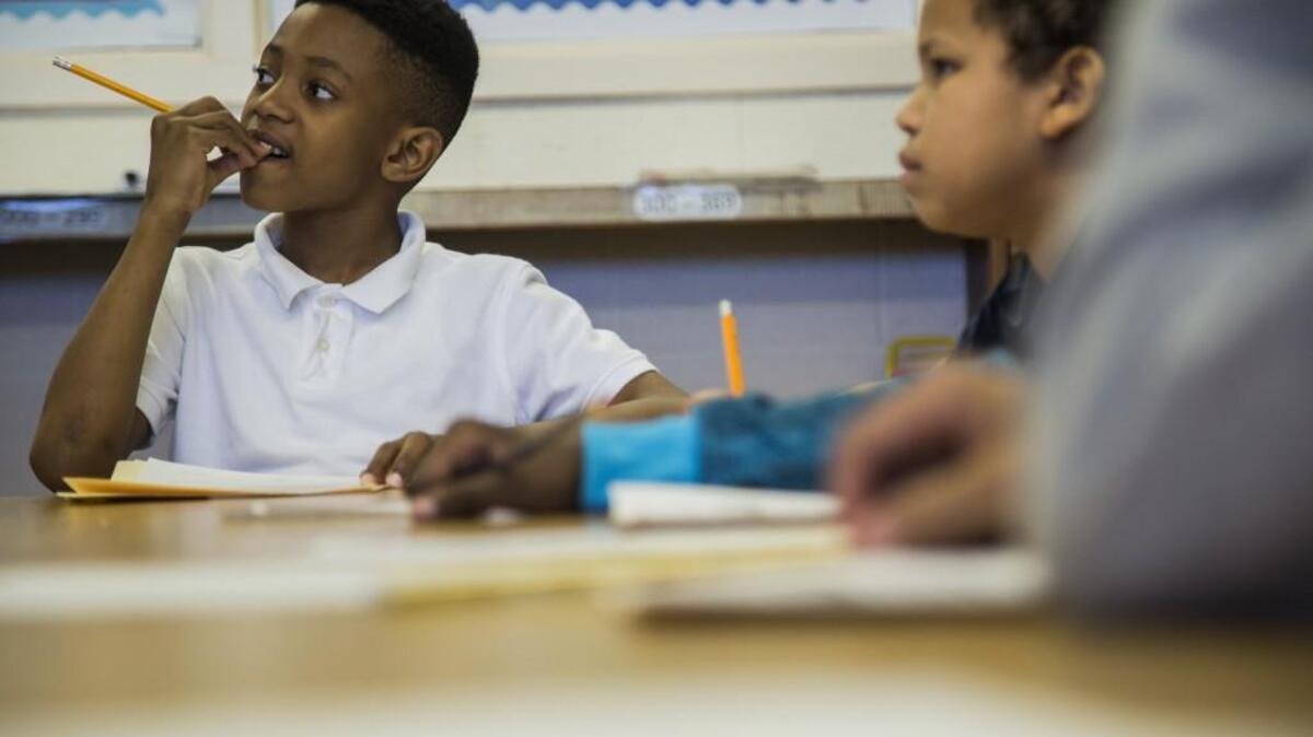 Zaman Timmons, left, and Ethan Rivers, fifth-graders at Montlieu Academy of Technology in High Point , participate in a math class for intellectually gifted students Monday, Feb. 13, 2017. Montlieu is a 95 percent minority and 98 percent free and reduced lunch school yet places a high percentage of students in its gifted program.