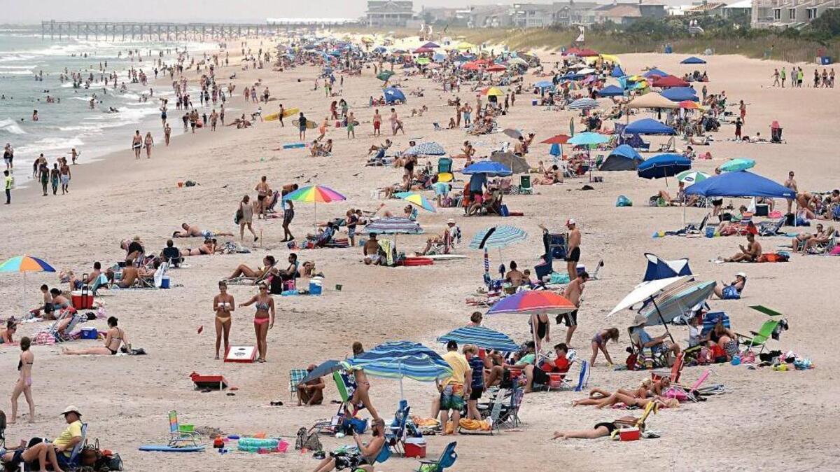 Wrightsville Beach is crowded with thousands of vacationers.