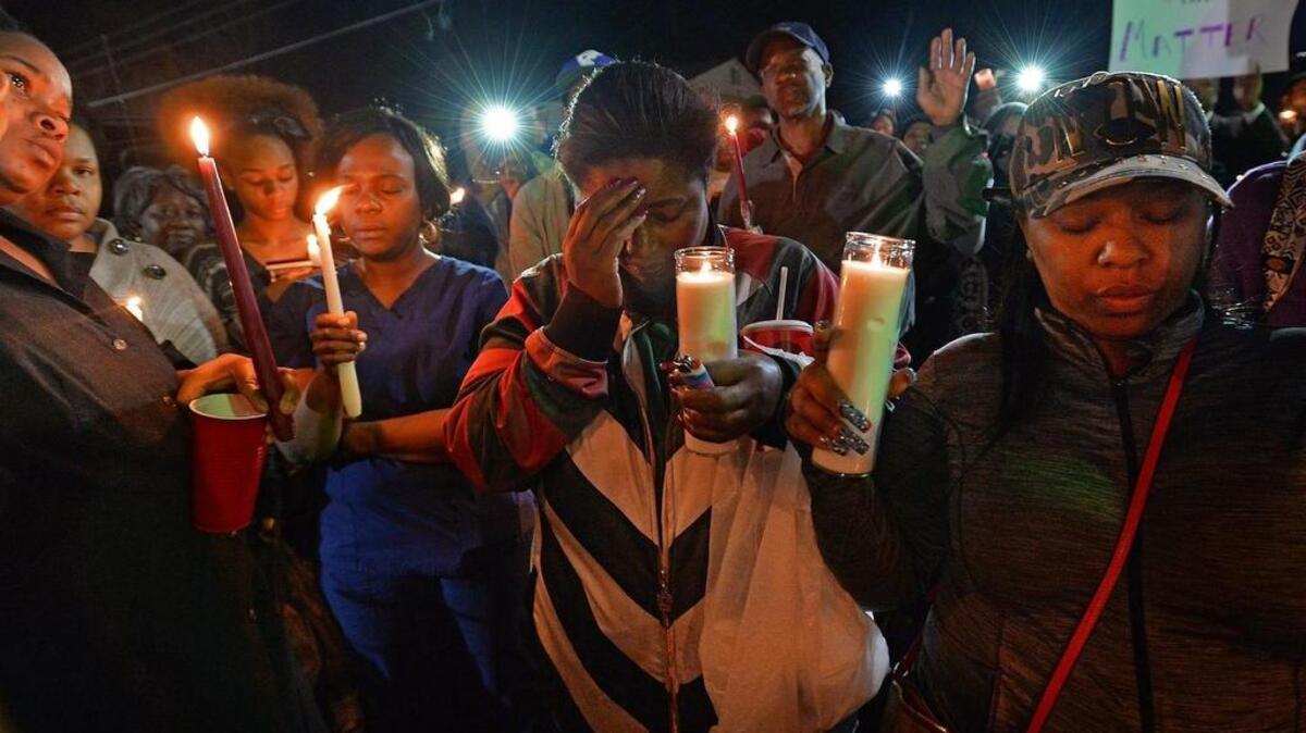 A vigil near where a Raleigh police officer shot and killed Akiel Denkins while trying to make an arrest for a felony drug charge