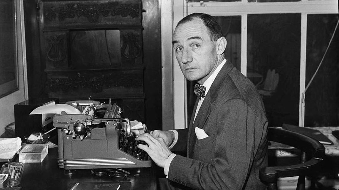 Joseph Alsop working at his Georgetown home in Washington, D.C. in 1963.