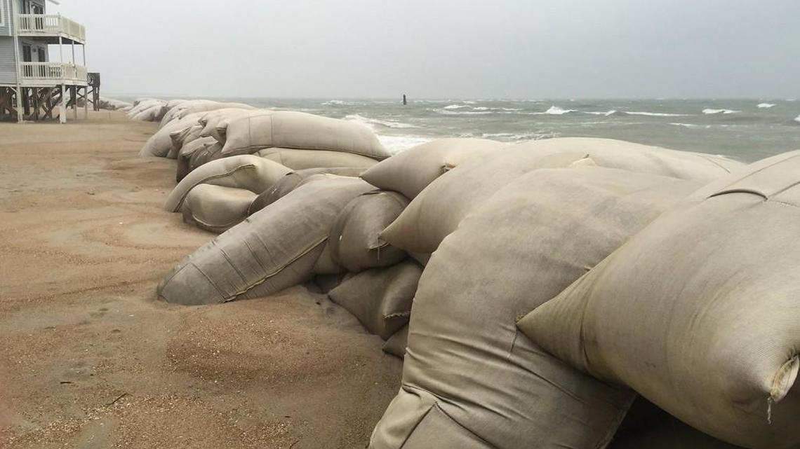 Sandbags lie in disarray along North Topsail Beach