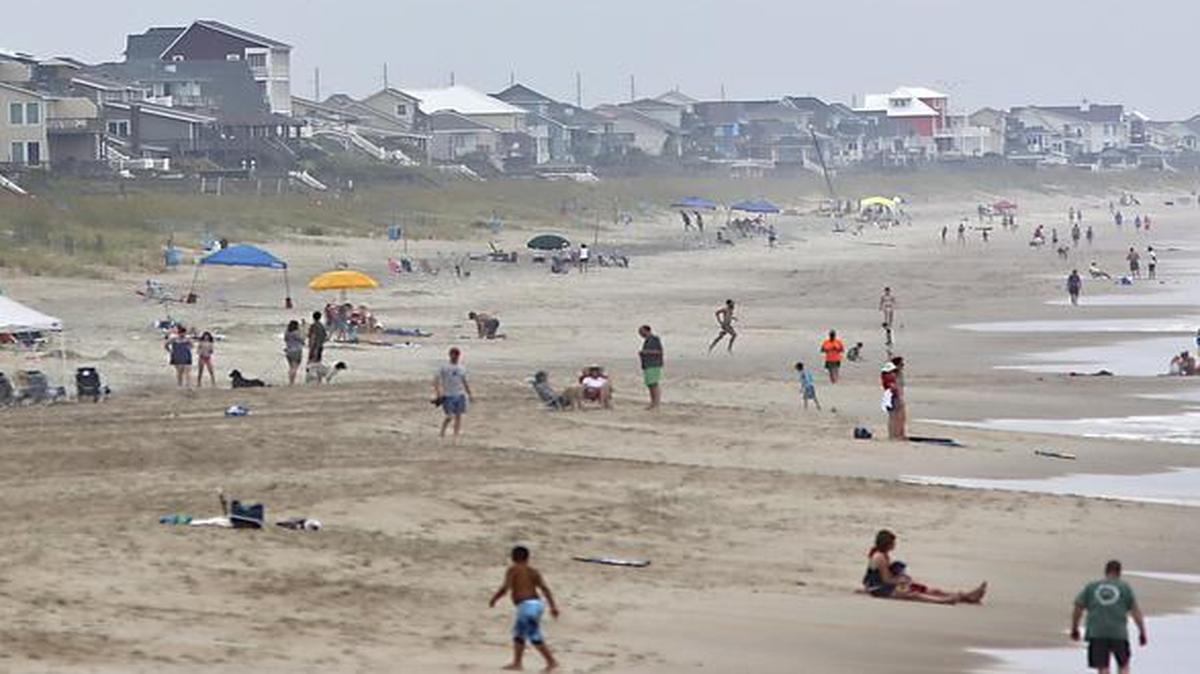 Beachgoers and residents enjoy Emerald Isle, N.C.