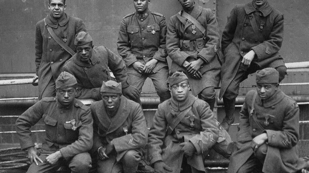 Black U.S. soldiers of the 369th (15th N.Y.) who won the Croix de Guerre for gallantry in action in 1918. Left to right. Front row: Pvt. Ed Williams, Herbert Taylor, Pvt. Leon Fraitor, Pvt. Ralph Hawkins. Back Row: Sgt. H. D. Prinas, Sgt. Dan Strorms, Pvt. Joe Williams, Pvt. Alfred Hanley, and Cpl. T. W. Taylor.