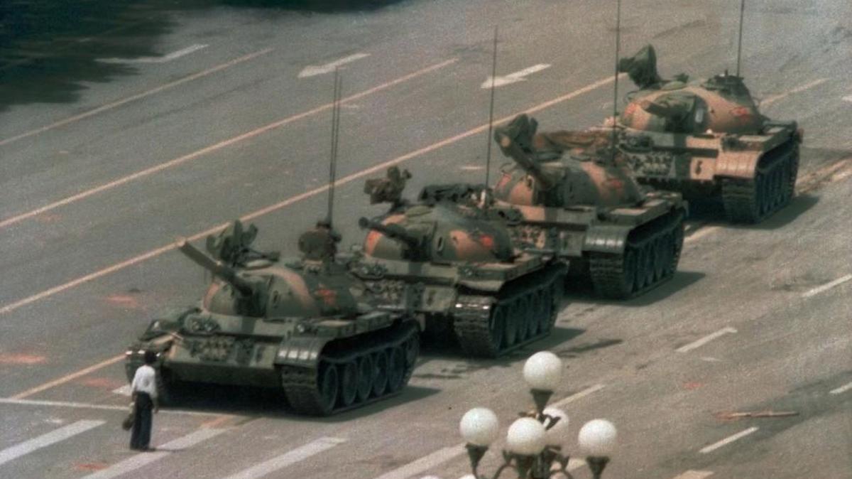 A Chinese man stands alone to block a line of tanks heading east near Tiananmen Square in this June 5, 1989, file photo.