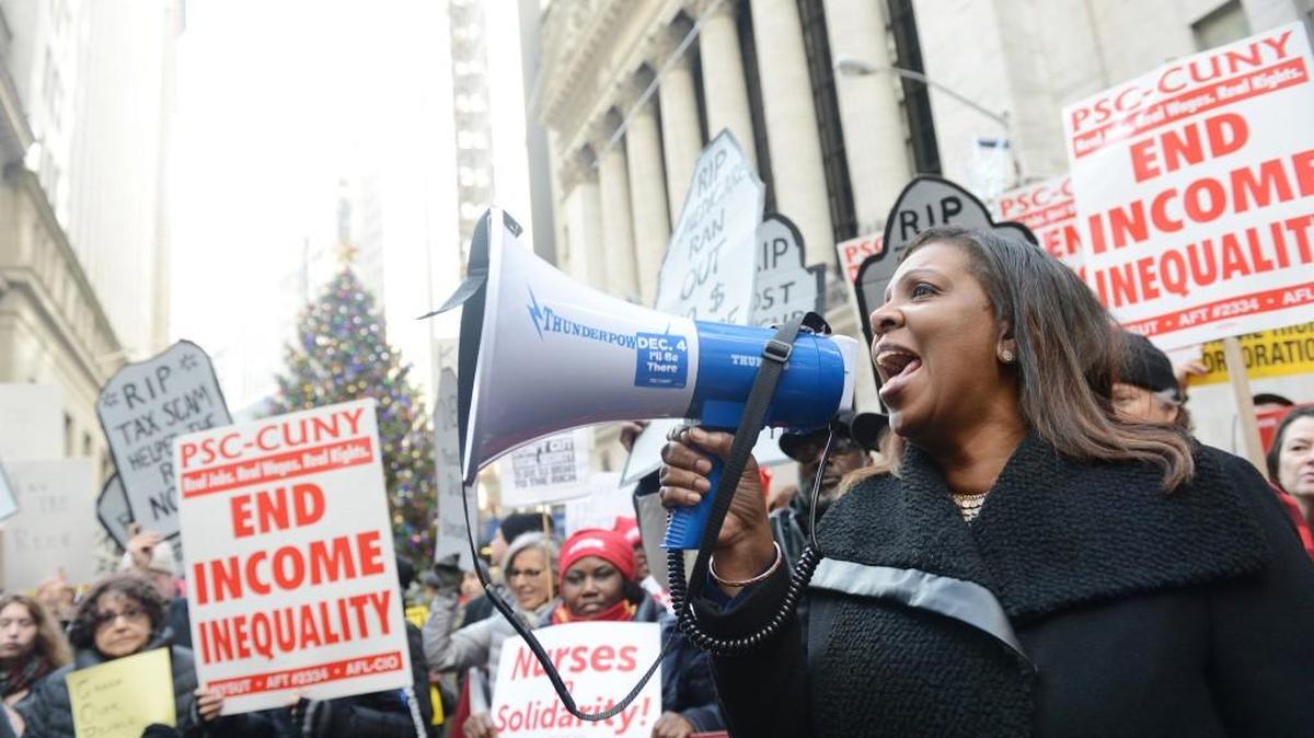 New York City Public Advocate Letitia James joins demonstrators gathered in front of the New York Stock Exchange to protest the GOP's tax plan on Tuesday, Dec. 19, 2017.