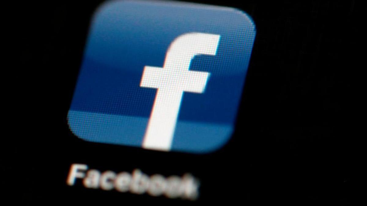 FILE - In this May 16, 2012, file photo, the Facebook logo is displayed on an iPad in Philadelphia.