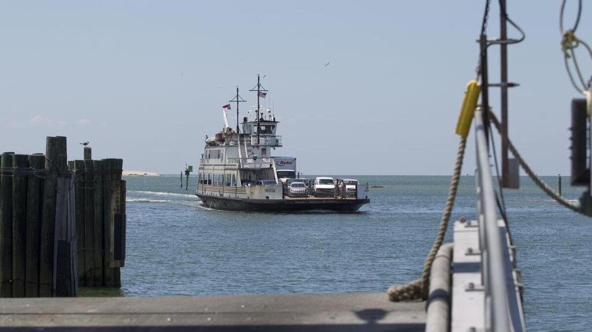 A ferry arrives in Hatteras with passengers from Ocracoke.