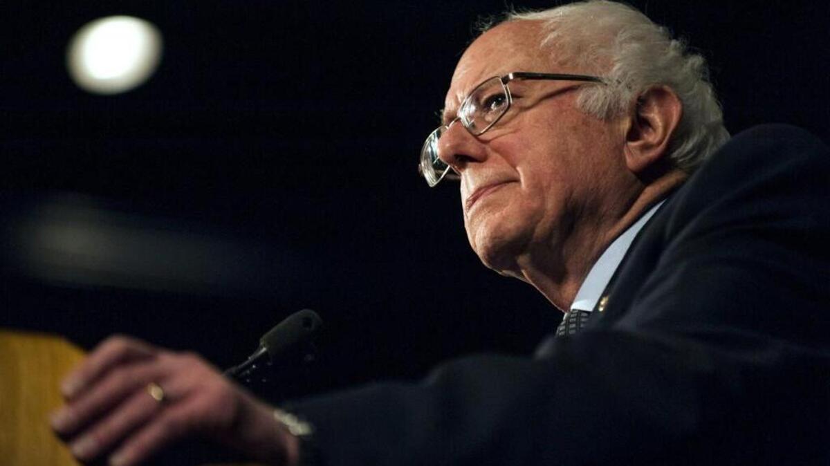 Democratic presidential candidate Sen. Bernie Sanders speaks to a crowd of supporters at the Minneapolis Convention Center.