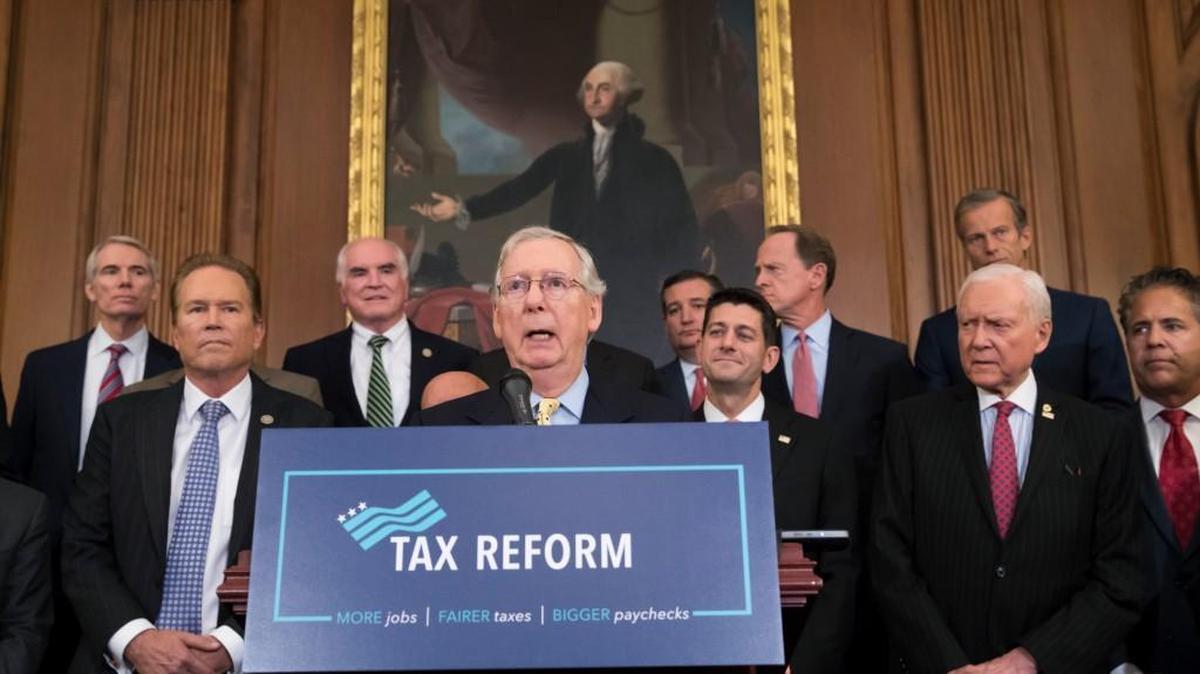 Senate Majority Leader Mitch McConnell, R-Ky., center, joins Speaker of the House Paul Ryan, R-Wis., and other GOP lawmakers to talk about the Republicans' proposed rewrite of the tax code for individuals and corporations, at the Capitol in Washington, Wednesday, Sept. 27, 2017. President Donald Trump and congressional Republicans are writing a far-reaching, $5-trillion plan they say would simplify the tax system and nearly double the standard deduction used by most Americans.