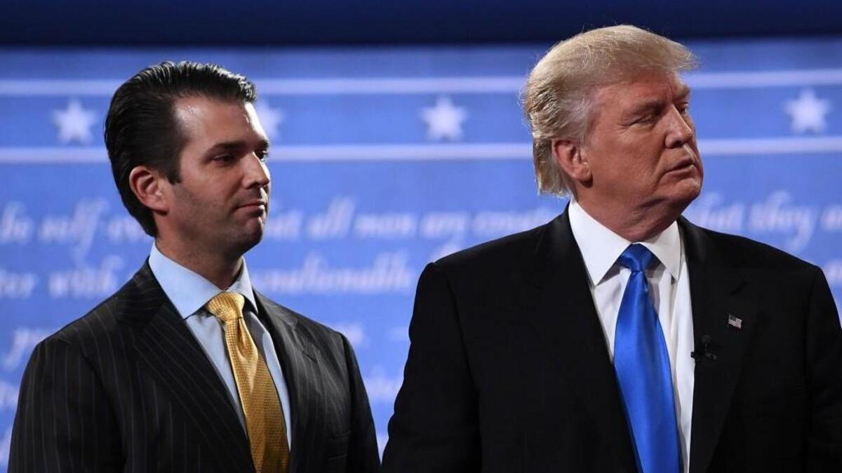 This photo taken on September 26, 2016, shows Republican nominee Donald Trump (R) standing with his son Donald Trump Jr. after the first presidential debate at Hofstra University in Hempstead, New York. Donald Trump Jr. admitted on July 10, 2017, to meeting a Russian lawyer in a bid to get dirt on his father's 2016 rival Hillary Clinton, plunging the White House into another Russia-related scandal. Trump Jr., confirmed reports that he was seeking compromising information on Clinton when he met Russian attorney Natalia Veselnitskaya in June 2016.