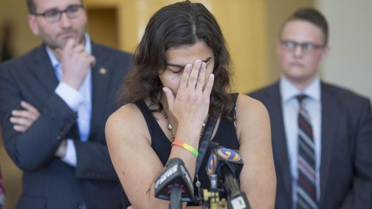 Equal rights supporter Lara Nazario pauses while speaking during a media event on Wednesday at the Charlotte-Mecklenburg Government Center to highlight efforts to repeal the deeply discriminatory House Bill 2.