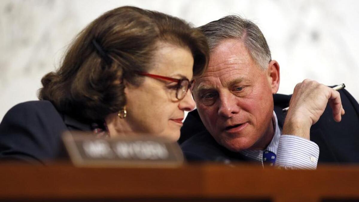 Senate Intelligence Committee Vice Chair Sen. Dianne Feinstein, D-Calif., talks with committee chairman Sen. Richard Burr
