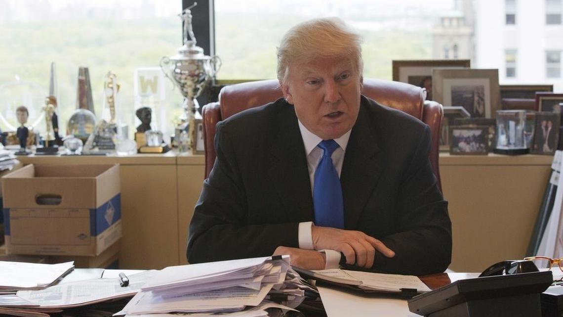 Donald Trump speaks during an interview with The Associated Press in his office at Trump Tower in New York.