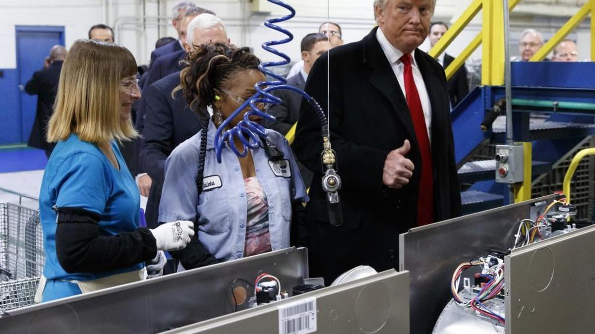 President-elect Donald Trump talks with workers during a visit to Carrier factory, Thursday, Dec. 1, 2016, in Indianapolis, Ind.
