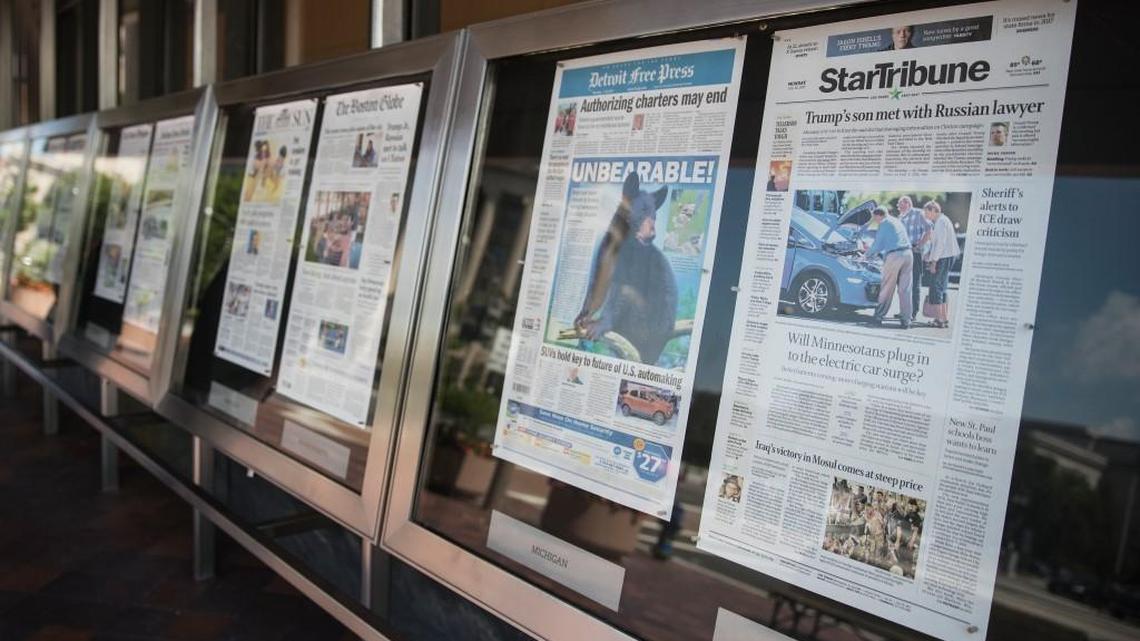Newspaper front pages are displayed at the Newseum in Washington, Monday, July 10, 2017.