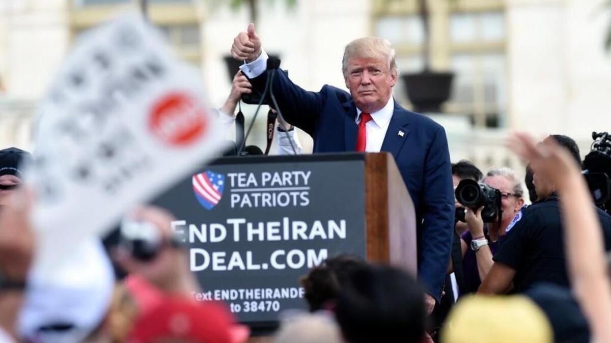Republican Presidential candidate Donald Trump gives a thumbs up to the crowd after speaking during a rally opposing the Iran nuclear deal outside the Capitol in Washington, Wednesday, Sept. 9, 2015.