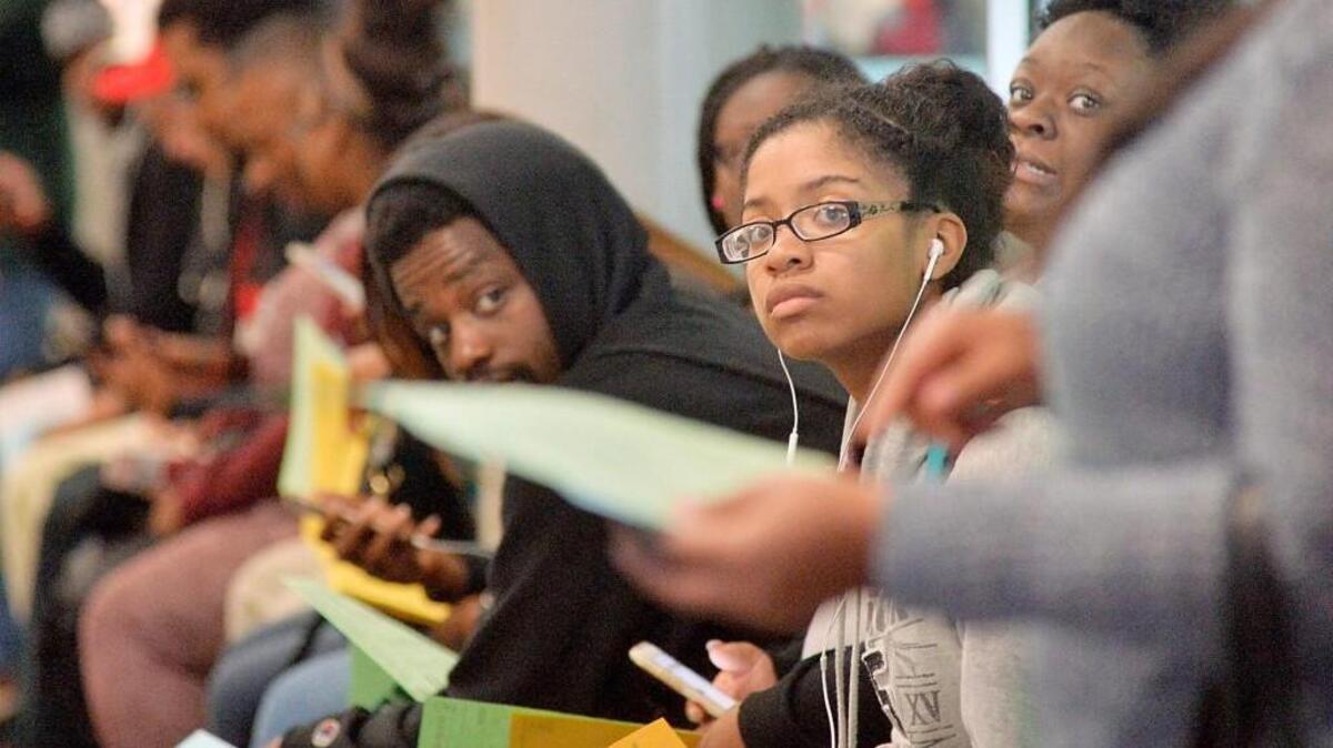Students of North Carolina Central University in Durham wait in a long line during a countywide glitch in the Board of Elections’ computer system on Election Day. County officials sought to extend voting hours to compensate for the slow pace. The young African American vote could be crucial to the battleground state. (Photo by Sara D. Davis/Getty Images)
