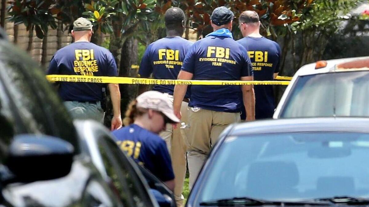 FBI agents return to the scene of the mass shooting at the Pulse nightclub in Orlando, Fla.