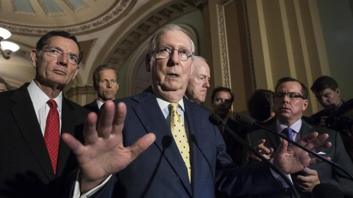 Senate Majority Leader Mitch McConnell, R-Ky., joined by, from left, Sen. John Barrasso, R-Wyo., Sen. John Thune, R-S.D., and Majority Whip John Cornyn, R-Texas, speaks following a closed-door strategy session, at the Capitol in Washington on June 20. Sen. McConnell says Republicans will have a “discussion draft” of a GOP-only bill scuttling former President Barack Obama’s health care law by Thursday.