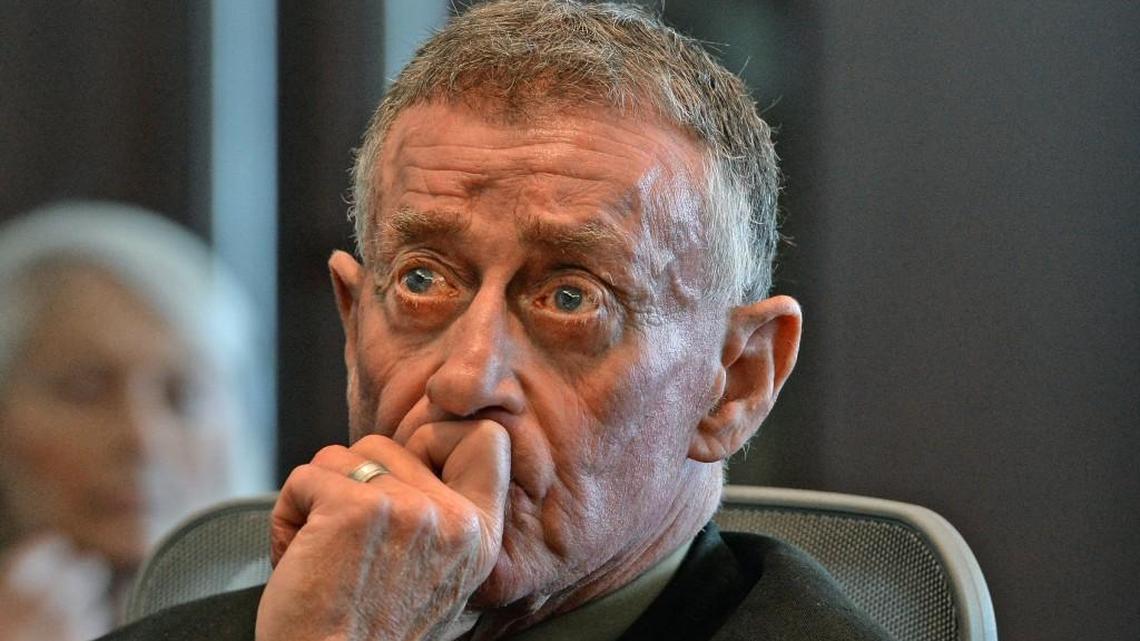 Michael Peterson listens as his attorney David Rudolf speaks during his plea hearing at the Durham County Courthouse in Durham on Feb. 24.