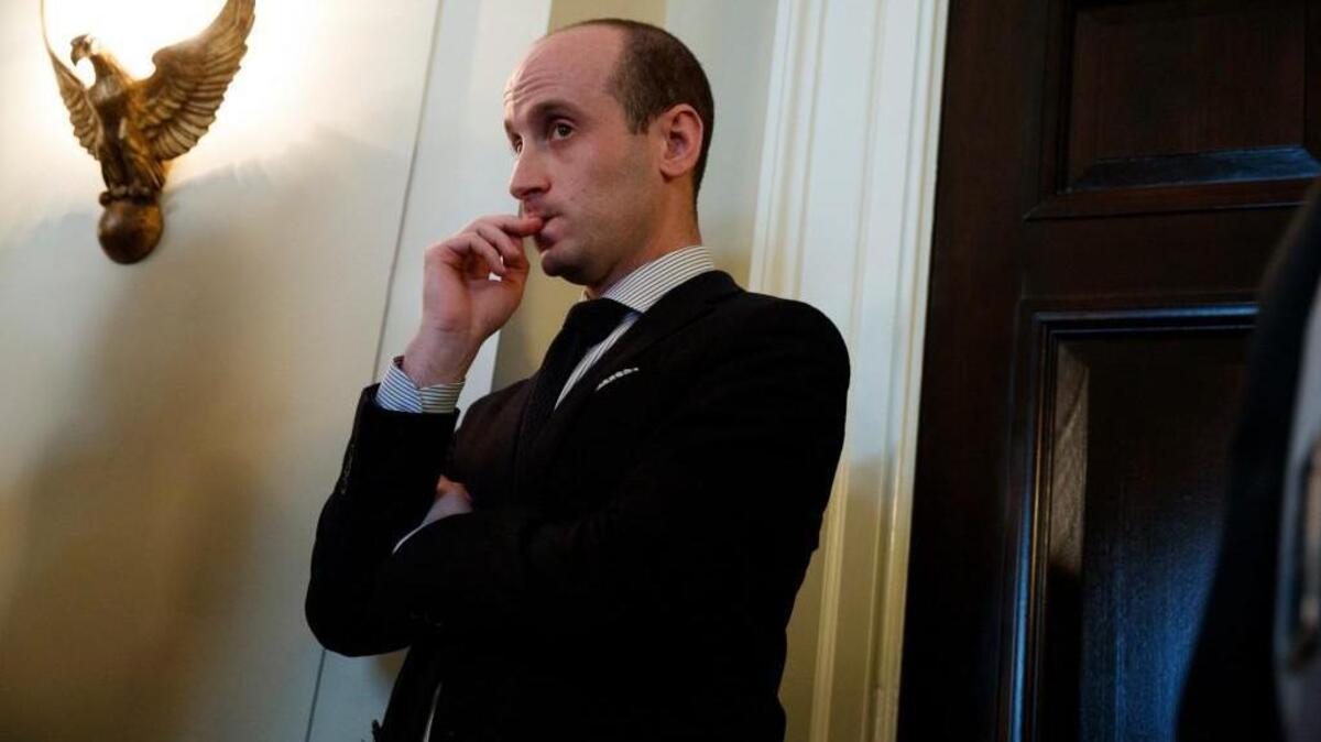 Senior White House adviser Stephen Miller listens as President Donald Trump speaks during a meeting with lawmakers on immigration policy in the Cabinet Room of the White House, Tuesday, Jan. 9, 2018, in Washington.