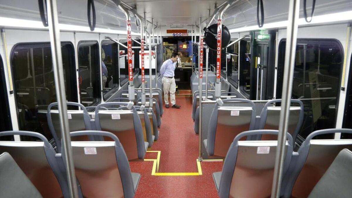 Geoffrey Green, a transit planner with Triangle Transit, checks out the interior of a Gillig BRT (Bus Rapid Transit) Plus bus on display at the Raleigh Convention Center in downtown Raleigh in December of, 2015. A tax to support a Wake County mass transit plan will be on the Wake ballot Tuesday.