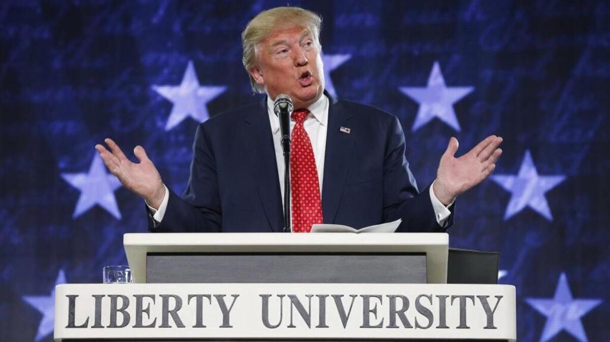 In this Jan. 18, 2016, file photo, Donald Trump gestures during a speech at Liberty University in Lynchburg, Va. Moving on a campaign promise, President Donald Trump said Thursday he will work for the repeal of the Johnson Amendment to free religious organizations from constraints on political activity.