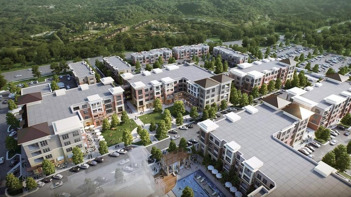 A project rendering gives an overview of the Carraway Village mixed-use development in on Eubanks Road in Chapel Hill. The developer of the luxury apartment complex will seek federal tax credits or other financing to include 50 affordable apartments for families.